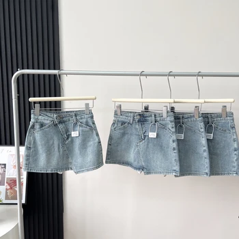 Лето 2023, новая джинсовая юбка с сексуальными краями в американском ретро стиле, женская облегающая мини-юбка трапециевидной формы с низкой талией на бедрах